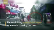 Man miraculously escapes scaffold collapse