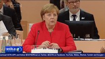 Merkel calls for compromise in tackling global challenges