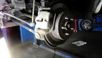 How to replace the rear brakes and rotor on a Toyota