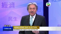 Hong Kong chief executive candidates cross swords in TV debate