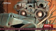 College art teacher creates iron sculptures from industrial waste