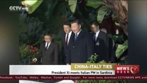 President Xi meets Italian PM Renzi in Sardinia