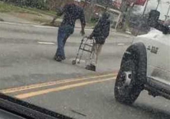 Man Gets Out of His Truck to Help an Elderly Man Cross the Road