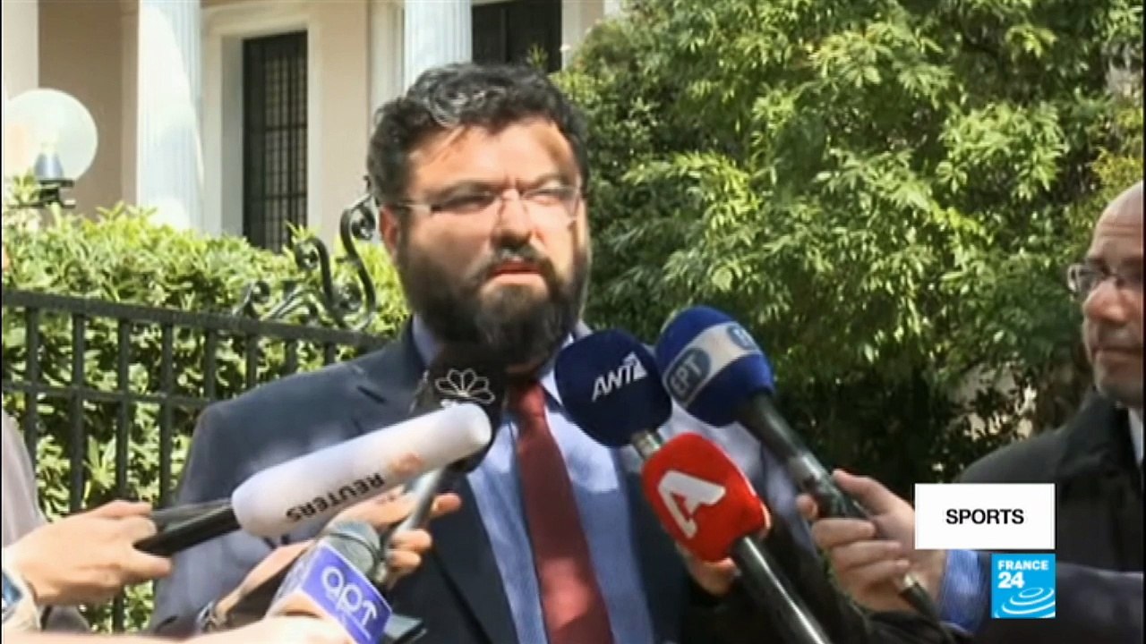 Football: Greek Superleague suspended indefinitely after PAOK Salonica enters pitch armed with a gun