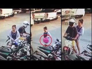 สองชายหญิง ฉกถุงที่เเขวนอยู่หน้า จยย.ในลานจอดรถห้างดัง ก่อนหนีลอยนวล