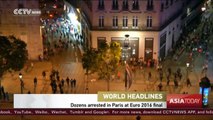 Dozens of football fans arrested in Paris over Euro 2016 final violence