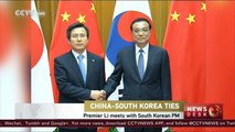 Premier Li meets with South Korean PM