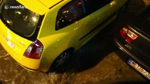 Bus becomes a boat as it drives through flooded streets in Greece