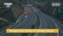 Risky business: Teenagers play chicken on highway