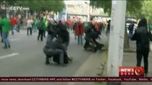 Protesters and police clash at Brussels rally against austerity measures