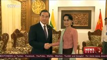 Chinese Foreign Minister Wang Yi meets Aung San Suu Kyi