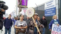 Protesters wait for Trump at the Mexican border