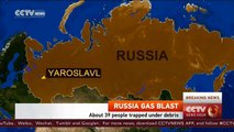 Dozens believed  trapped after a gas explosion in a residential building in Russia,