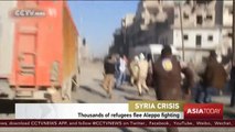 Thousands flee intense fighting in Aleppo