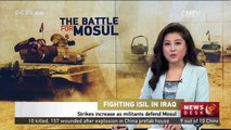 Strikes increase as militants defend Mosul