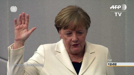 Avec une courte majorité, Merkel entame son 4e mandat