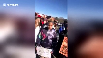 US students walkout to demand tighter gun control one month after Florida shooting