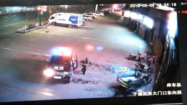 Policeman catches woman falling from building with bare hands