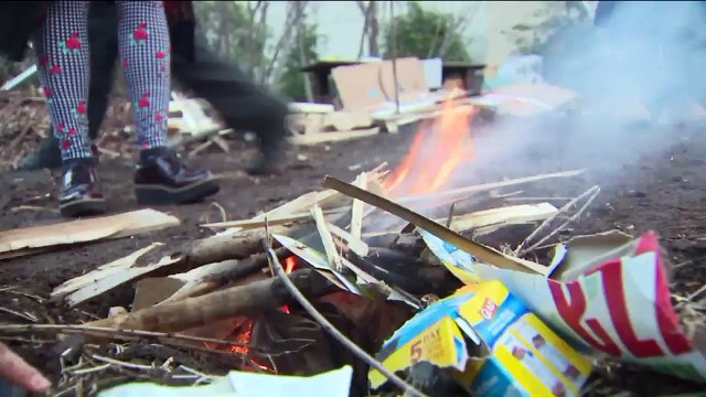 Neighbors Jump Over Fire to Celebrate the Season During Ancient Tradition in NYC