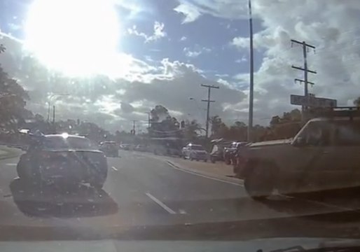 Driver Reverses Towards Oncoming Traffic and Mounts Median Strip After Hitting Car