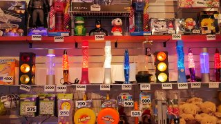 Going for the glitter lamp at Nickel City arcade! | The Crane Couple