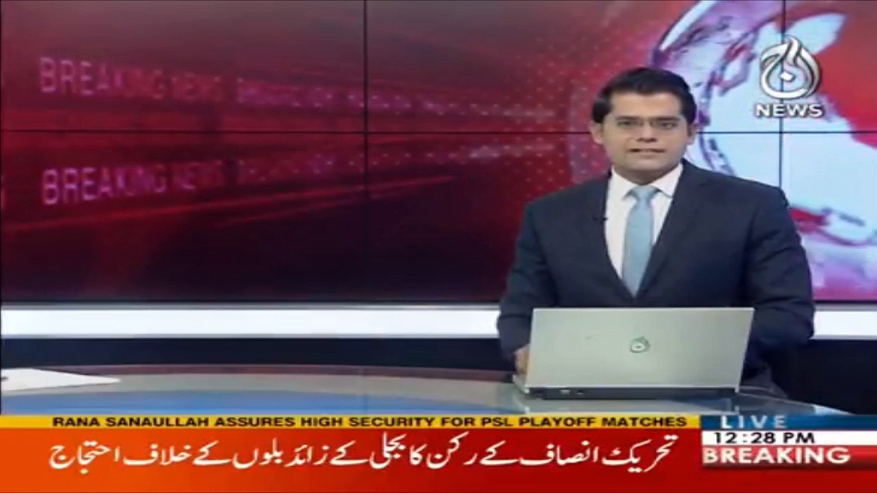 PTI MNA protests wearing garland of electricity bills to NA session