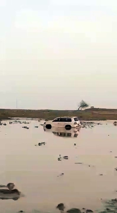 CAR IN LAKE