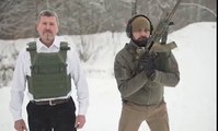 Bulletproof vest company boss makes an employee shoot him with a KALASHNIKOV assault rifle from just 33ft away to prove his product works
