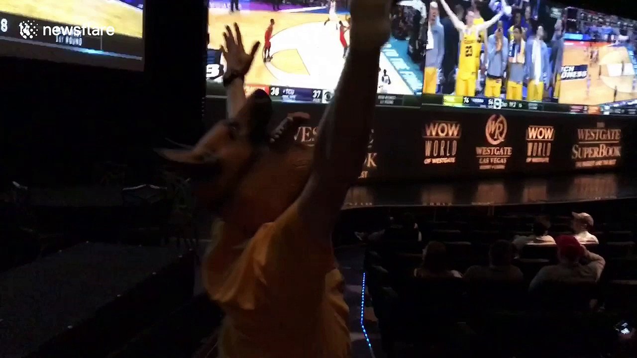 Lone UMBC fan at Las Vegas casino celebrates team’s historic upset win