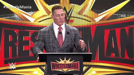 John Cena shares a kiss with Nikki Bella during WrestleMania 35 press conference