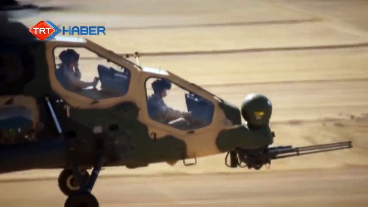 Milli saldırı helikopteri ATAK'ı silahlarını kullanırken görün