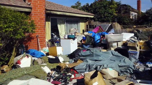 Rats and Mountains of Trash Found at Hoarding House Seized by Authorities