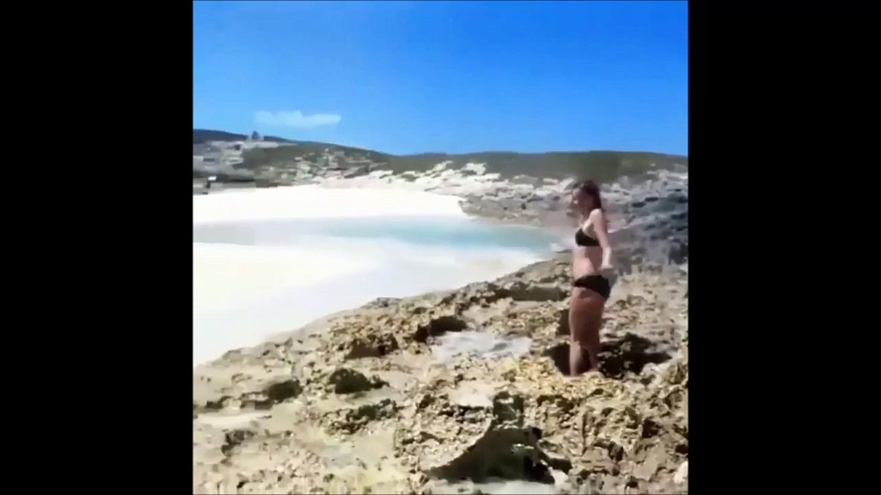Cette touriste s'amuse avec un geyser... Douche en profondeur!!!