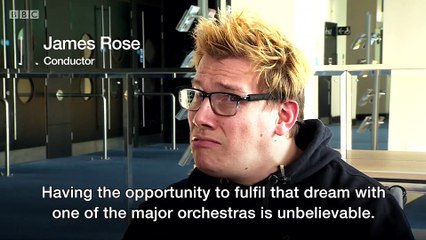 James Rose uses a baton attached to his head as he cannot control his arms