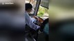 Vietnam bus driver uses TWO hands to make notes while driving on highway