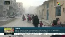 Residentes de Saqba en Guta Oriental regresan a sus hogares