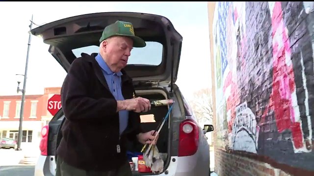 87-Year-Old Painter Helps Restore Vandalized Ronald Reagan Birthplace Mural