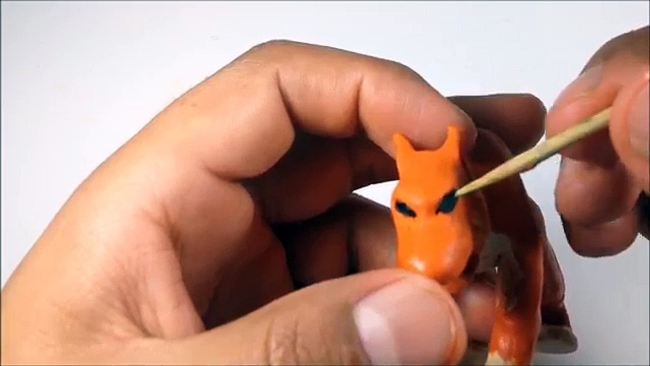 Como hacer un Tigre dientes de sable de Plastilina/How to make a saber-toothed tiger with Plasticine