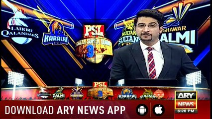 Traffic warden stands with a portrait of Ramiz Raja