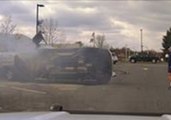 Passers-By Flip Over Burning Car to Rescue Driver Trapped After Crash