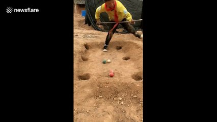 Chinese village boy makes pool table out of clay