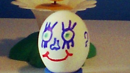 40. our hero Egghead playing with butterflies.