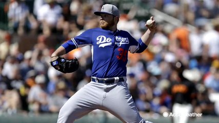 Why do MLB teams travel for spring training?