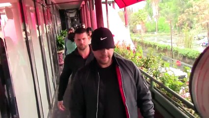 Kim Kardashian Stays Dry Wearing YEEZY Season 7 Scuba Leggings In The Rain