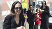 Cool mom! Angelina Jolie, 42, treats Vivienne and Zahara to frozen desserts... after revealing her six kids 'don't really do a lot of social media'