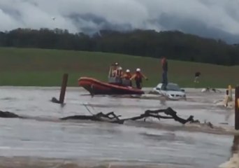 California Firefighters Rescue Person Stranded on Car in Flash Flood