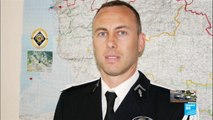 Police officer who swapped himself for hostage dies