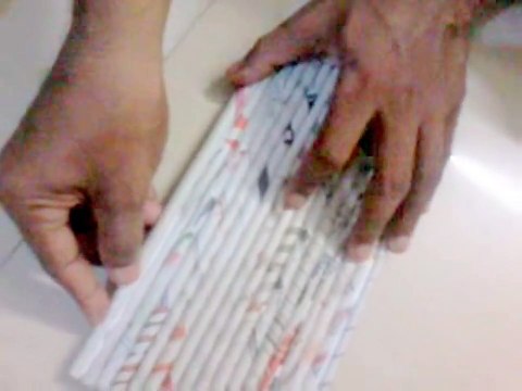 Two models of doll bunk bed - one using popsicle sticks and other with news paper crafts