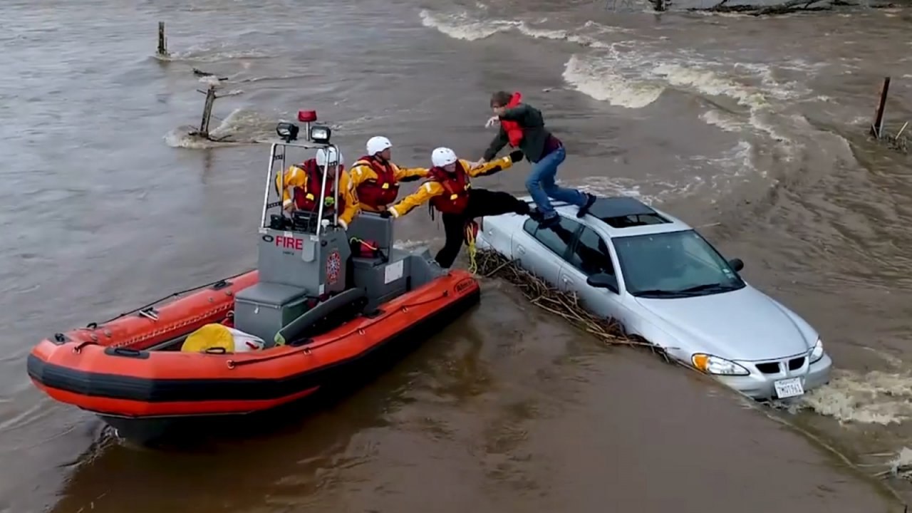 Dramatic Timelapse Shows Motorist Rescued From...