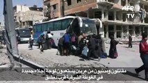 مقاتلون ومدنيون من عربين يستعدون لموجة اجلاء جديدة في الغوطة الشرقية
